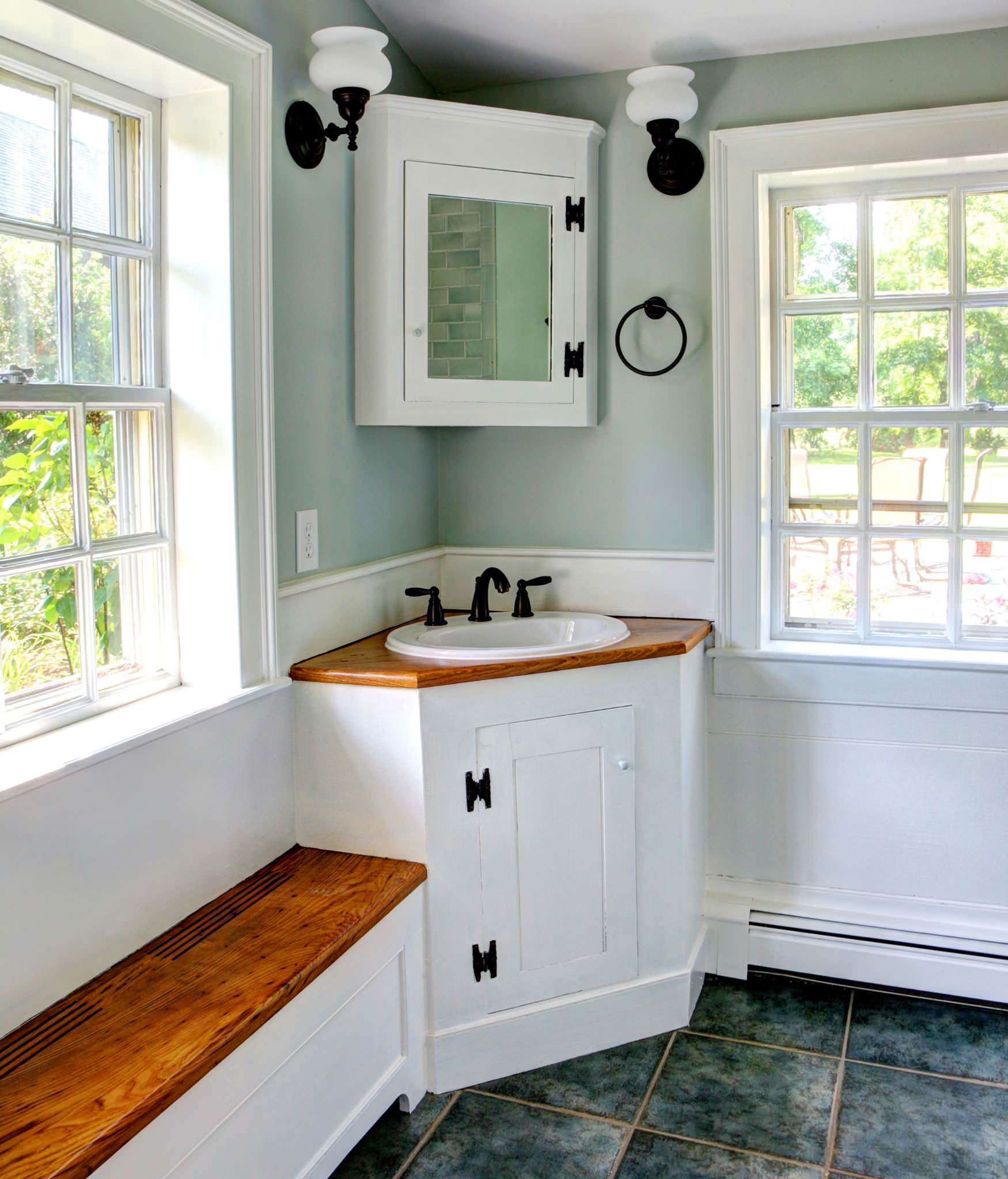 Custom Corner Vanity and Mirrored Cabinet