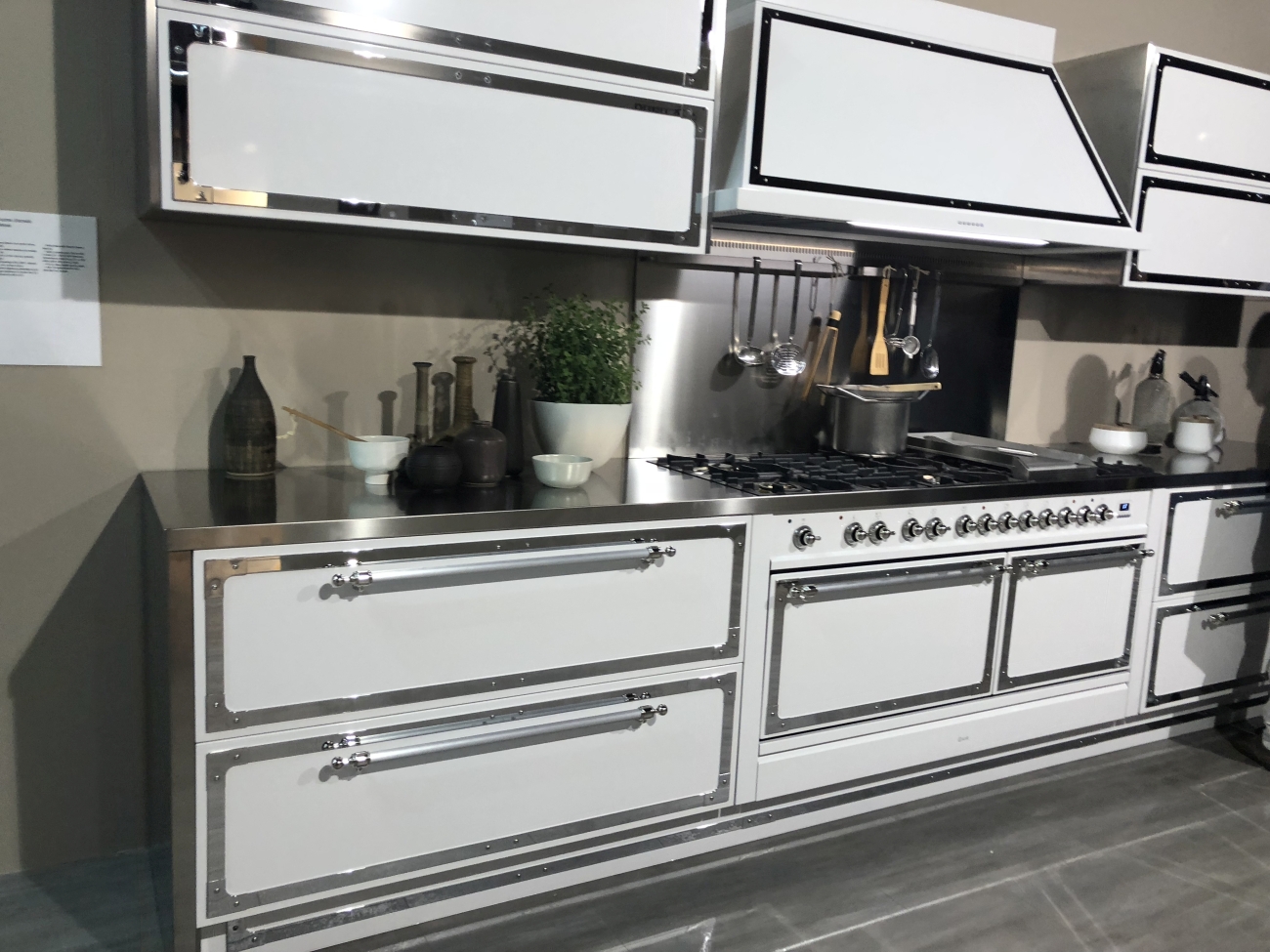 Bright white kitchen cabinets with stainless steel accents